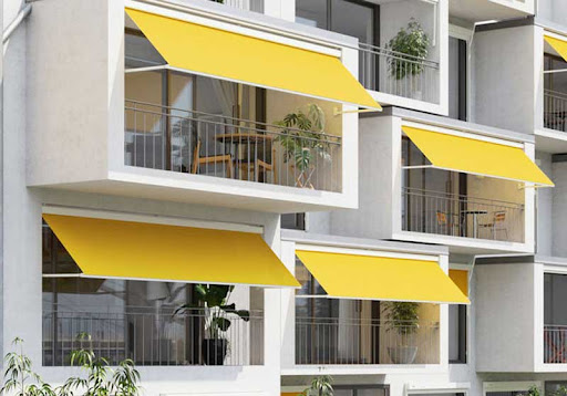 retractable drop arm awnings